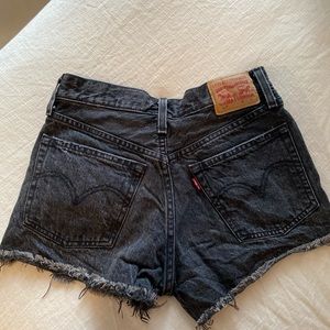 Levi black distressed shorts